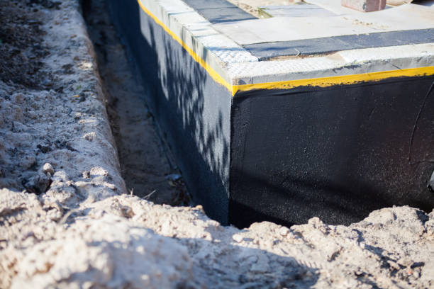Professional Waterproofing technician working in Dover, NJ